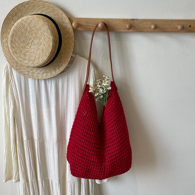 Lazy wind tote bag women's new niche high-end woven bag seaside vacation shoulder bag