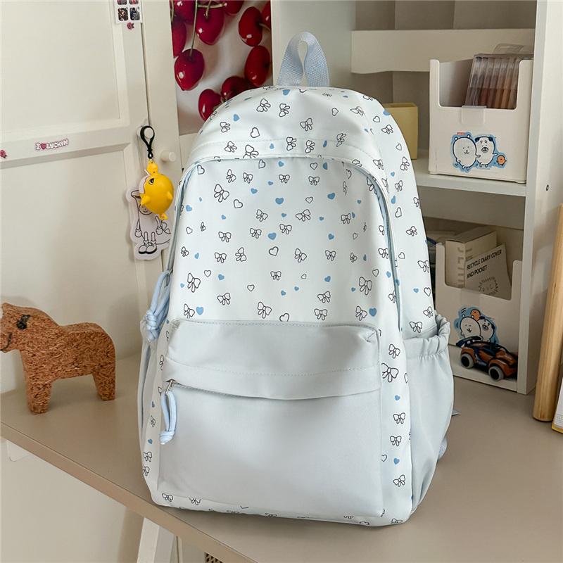 Cute Heart and Bow Print School Backpack with Front Pocket Top Handle Casual Daypack for Girls Students