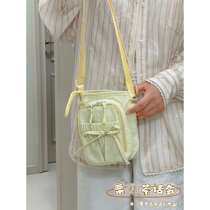 

2025 New Lightweight Mobile Phone Bag Student Water Bottle Bag Leisure Outdoor Messenger Bag Water Cup Bag Travel Small Bag Women Daylight yellow