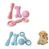 4 Piece Dog Chew Toy Set TPR Material Durable Teeth Cleaning Ball Bone Stick for Puppy Dental Care and Interactive Play