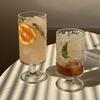 High-Stem Juice Glass: Tree Grain Design, Straight Cylinder, Transparent for Home Use, Perfect for Fruit Tea, Sparkling Water, or Cocktails.