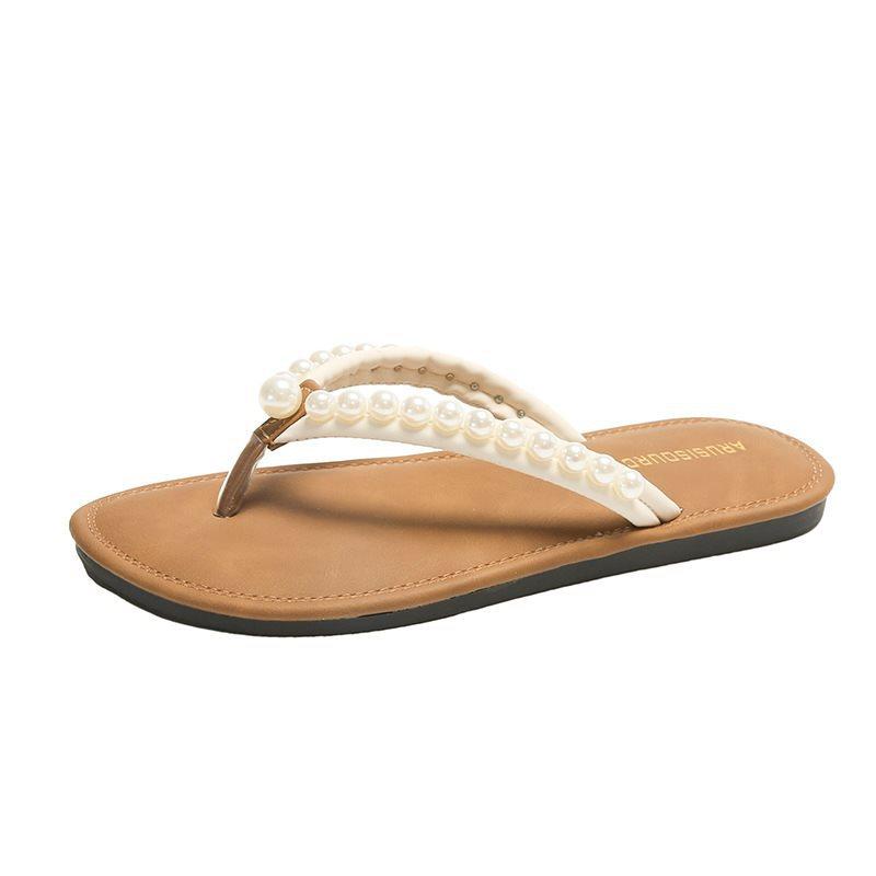 Large size vacation pinch foot soft flip-flops women's summer outer wear foreign trade flat bottom new year pearl seaside 2025