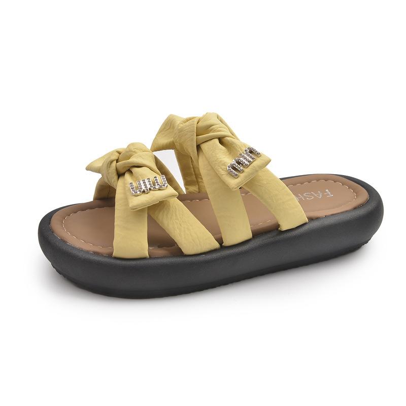 Thick bottom outer wear bow feeling seaside beach Internet celebrity cool slippers women step on shit feeling fashion fairy new