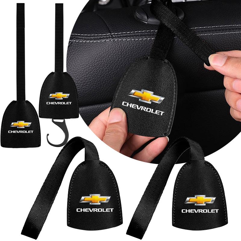 For Chevrolet KM0Leather Car Seat Back Hooks Portable Hanging Bag Rack for Chevrolet Crvalier Malibu Captiva Cruze Silverado Spark Valve Stems