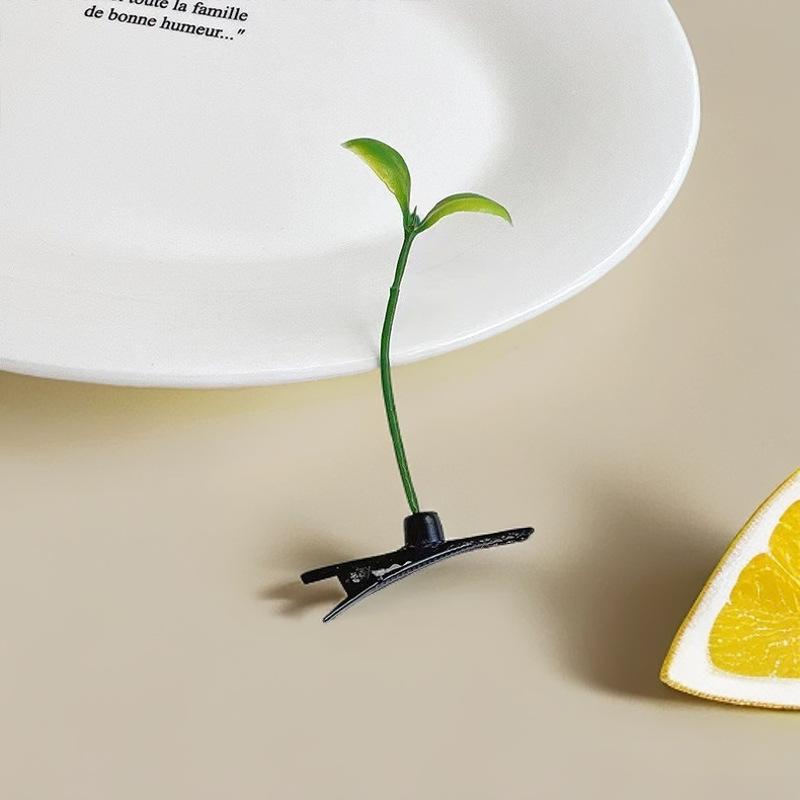 

Необычная заколка для волос в виде ростка зеленой травы — милый и маленький головной убор для забавного аксессуара