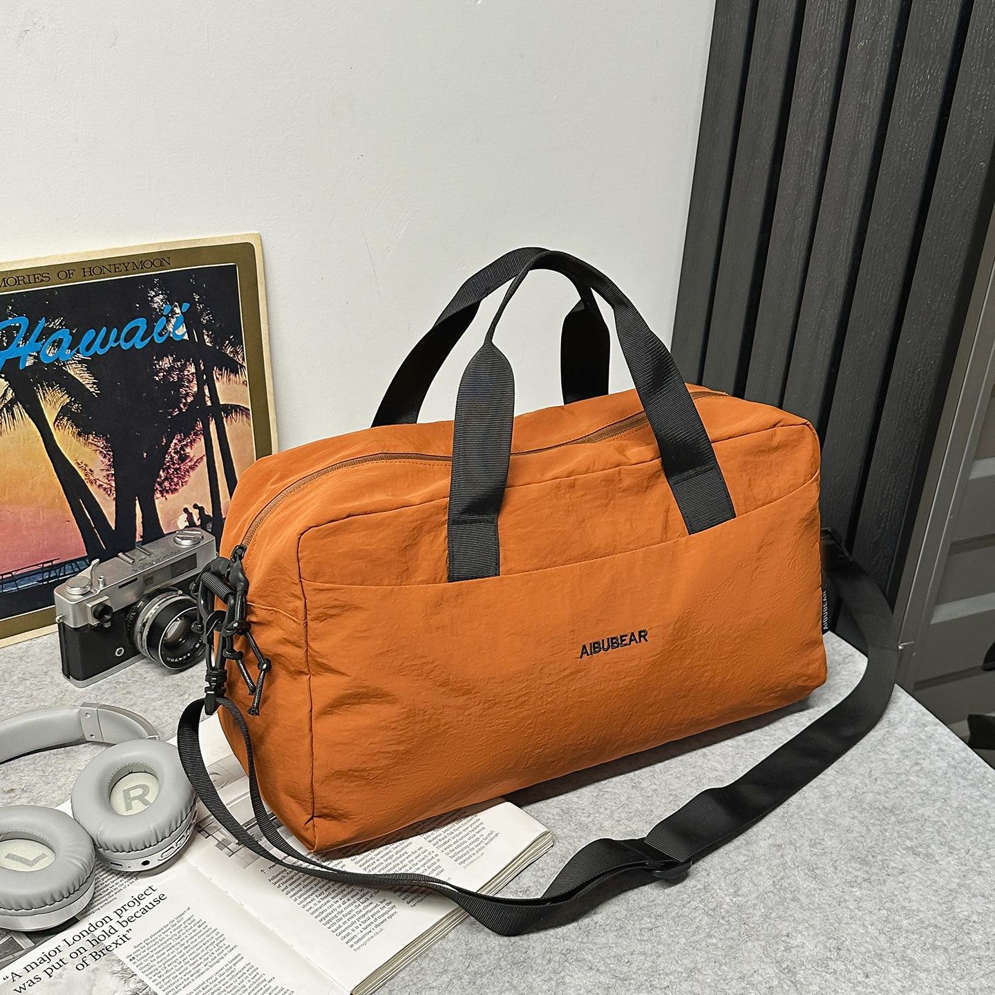 

Autumn and winter Boston crossbody handbag sports light commuter leisure bag men s and women s shoulder bag tide помаранчевий