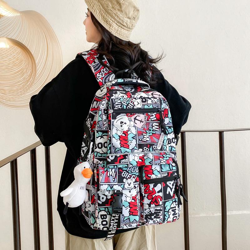 Fashion new casual backpack fashion graffiti large capacity bag female couple high school junior high school primary school bag