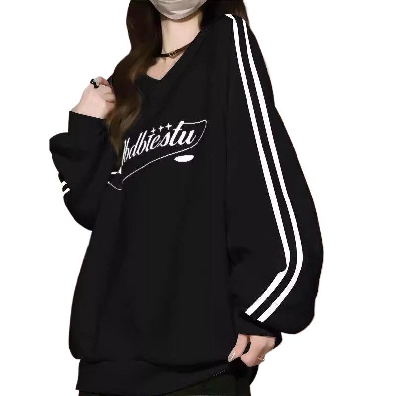 Bluza damska w paski z dekoltem w serek - Kolekcja Wiosna/Jesień 2024