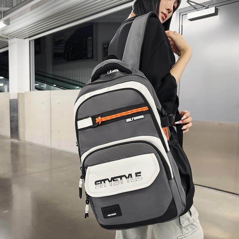 Großer, leichter Schulranzen für Mittelschüler mit großem Fassungsvermögen und Farbblock-Design für Herren