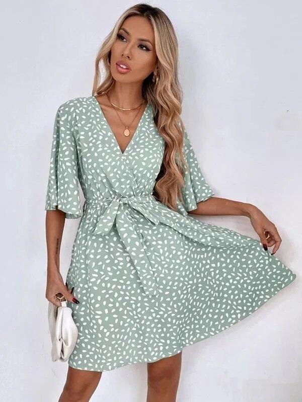 Letnie eleganckie damskie rękawy nietoperzowe seksowny dekolt w serek nieregularna sukienka nowa damska moda z nadrukiem luźna Mini wieczorowa sukienka Maxi D41