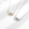 Elegant Devil's Eye Pendant Necklace for Women - European & American Fashion, Double Hand Hug Design, High-End Clavicle Chain