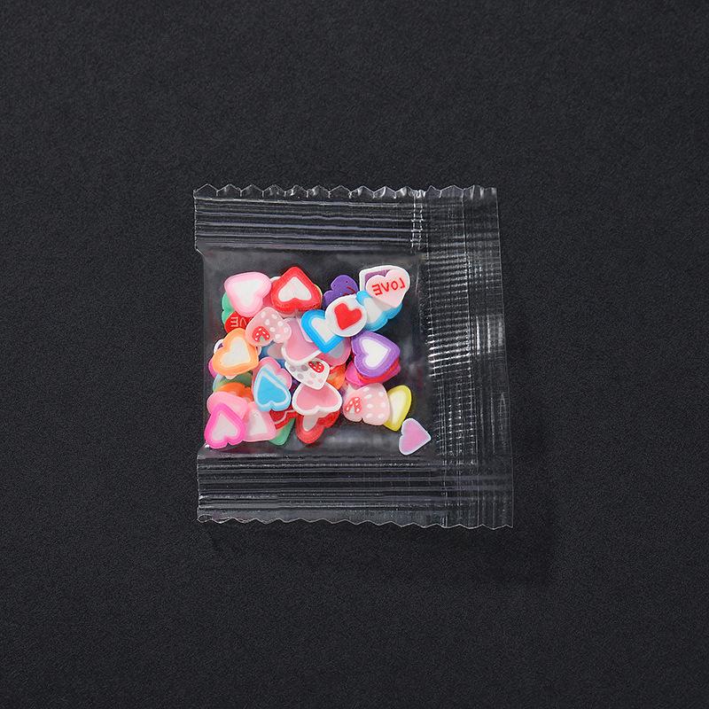 Cartoon Polymer Clay Slices: Butterfly, Flower, Moon Shapes for DIY Nail Art Accessories.
