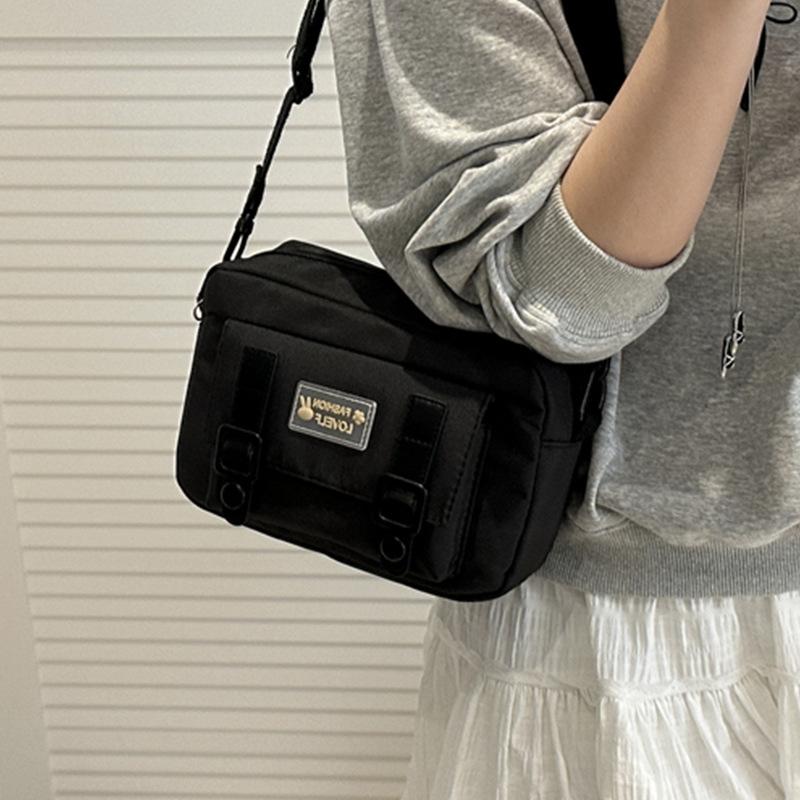 2025 niche vitality girl small fresh youth simple Mori cute canvas oblique span bag woman