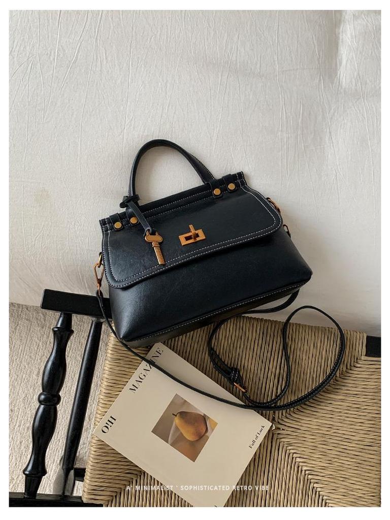 Koreanische Retro Damen Umhängetasche: Vielseitiges, Schlichtes, Atmosphärisches Design mit Großer Kapazität für den Täglichen Arbeitsweg.