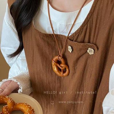 Handcrafted Wooden Pendant Necklace with Adjustable Cord Natural Material Lightweight Design Unique Shape for Everyday Wear and Gift