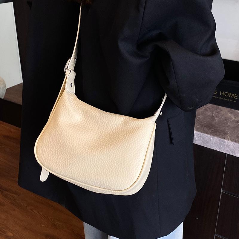Simple and fashionable bag women's 2025 new Korean version versatile shoulder underarm bag niche high-end dumpling bag messenger bag