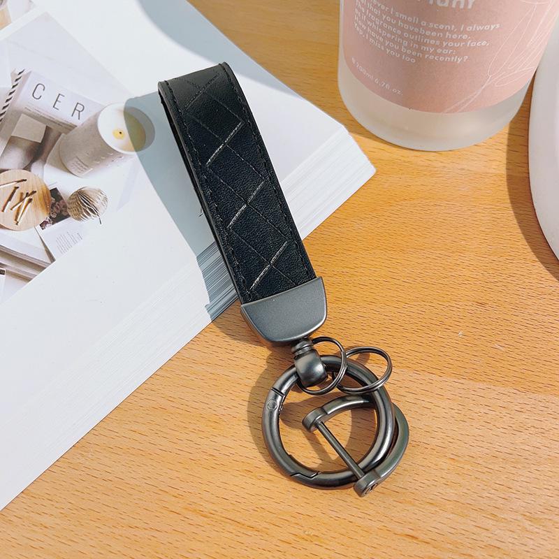 

Персонализируемый кожаный брелок для ключей с пряжкой в форме подковы для пар, дизайн с защитой от потери, стильная металлическая подвеска для автомобиля. чёрный