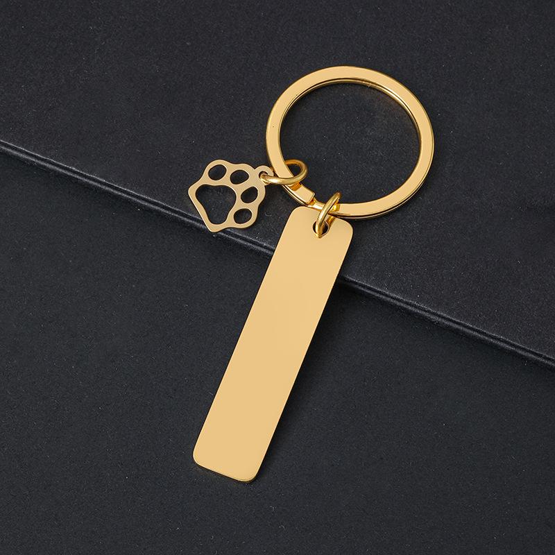 Breloczek do kluczy z łapą psa drukowaną laserowo - Międzynarodowy metalowy prezent