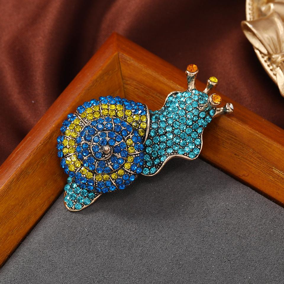 

Винтажные броши с деликатным дизайном, полностью украшенные кристаллами и стразами, в виде улитки, с пряжкой, для женщин, креативный дизайн, для вечеринок, свадебные, значки