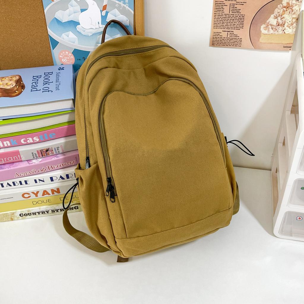 Schoolbag Solid color canvas backpack female Harajuku simple large capacity high school college student schoolbag Mori travel texture backpack