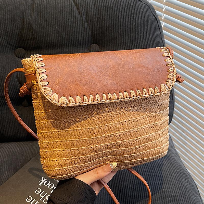 Spring and summer new Korean version ins wind straw woven bucket bag niche casual texture Mori holiday wind messenger bag women