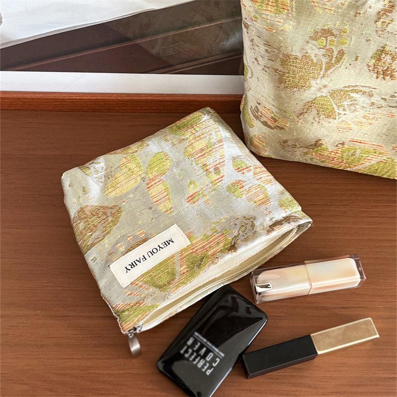 "Compact Fresh Cosmetic & Skincare Travel Bag - Portable Handheld Storage for Toiletries & Underwear"