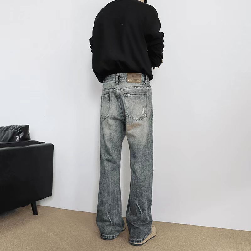 Hot diamond fake hole micro-horn jeans men's trousers loose trend autumn new ruffian handsome casual pants