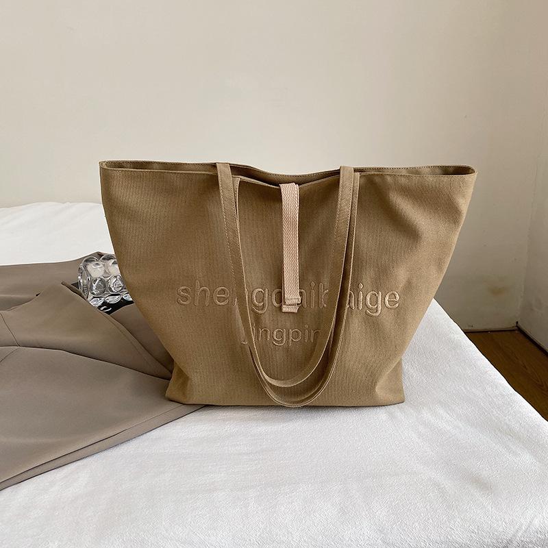 

Холщовая сумка женская большой вместимости 2025 новая универсальная простая для отдыха на одно плечо для занятий студентам колледжа хаки