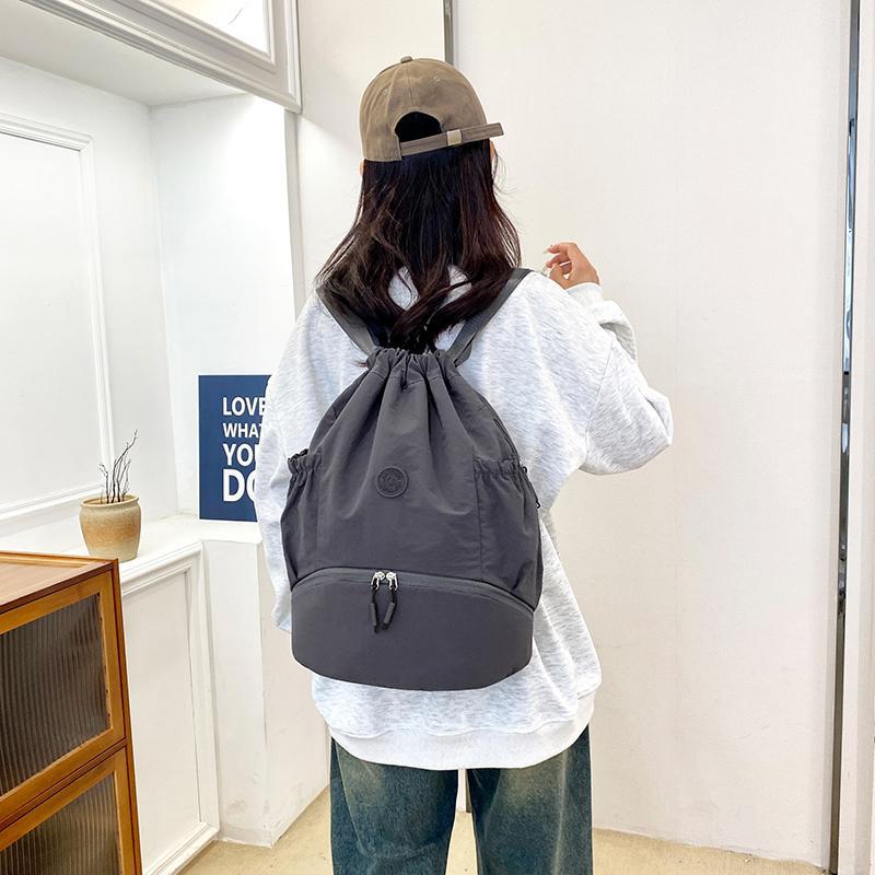 Schoolbag Korean backpack women's 1011 new lightweight casual fashion drawstring nylon backpack student travel mountaineering bag tide