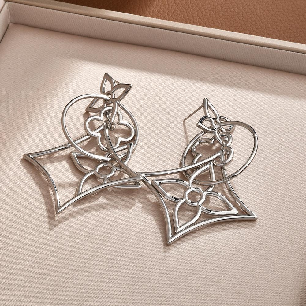 Light Luxury High-end Sense Exaggerated Temperament Earrings Four-leaf Clover Geometric Rhombus Hollow Mosquito Coil Disc Earrings Ear Jewelry