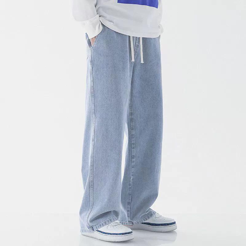 Męskie Jeansy Plus Size Jasnoniebieskie z Elastycznym Pasem - Luźne, Szerokie Nogawki, Sznurek, Długie do Ziemi, Codzienne i Wszechstronne.