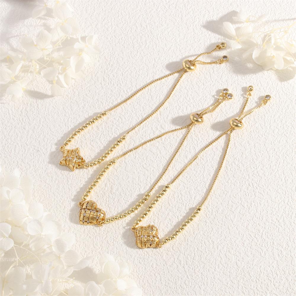 Měděný zirkonový náramek Hvězdná obloha Slunce se srdíčkem a kulatými korálky