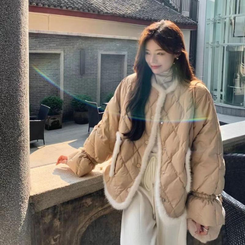 

Зимняя куртка-пуховик для женщин XL