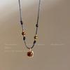 Tiger's eye stone pendant, leather rope necklace, autumn and winter medieval light luxury decorative sweater chain, versatile accessories