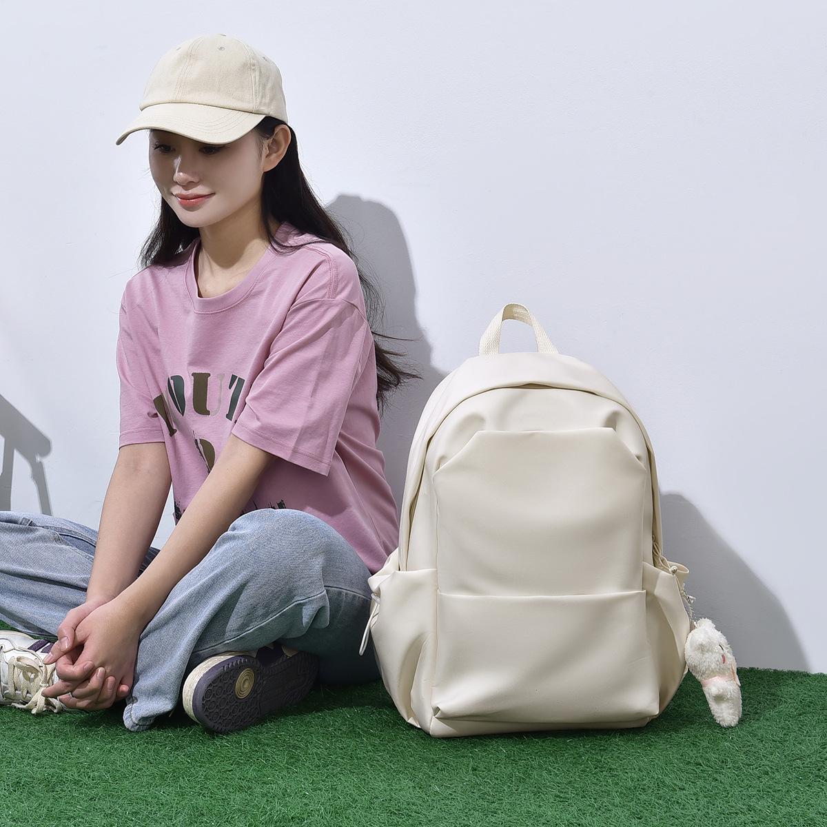 

Casual Unisex Backpack with Cute Pendant - Large Capacity, Multifunctional Student Bag