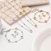 18K Gold Four-Leaf Clover Jewelry Set: Necklace, Bracelet, and Earrings in Titanium Steel with Zirconia.