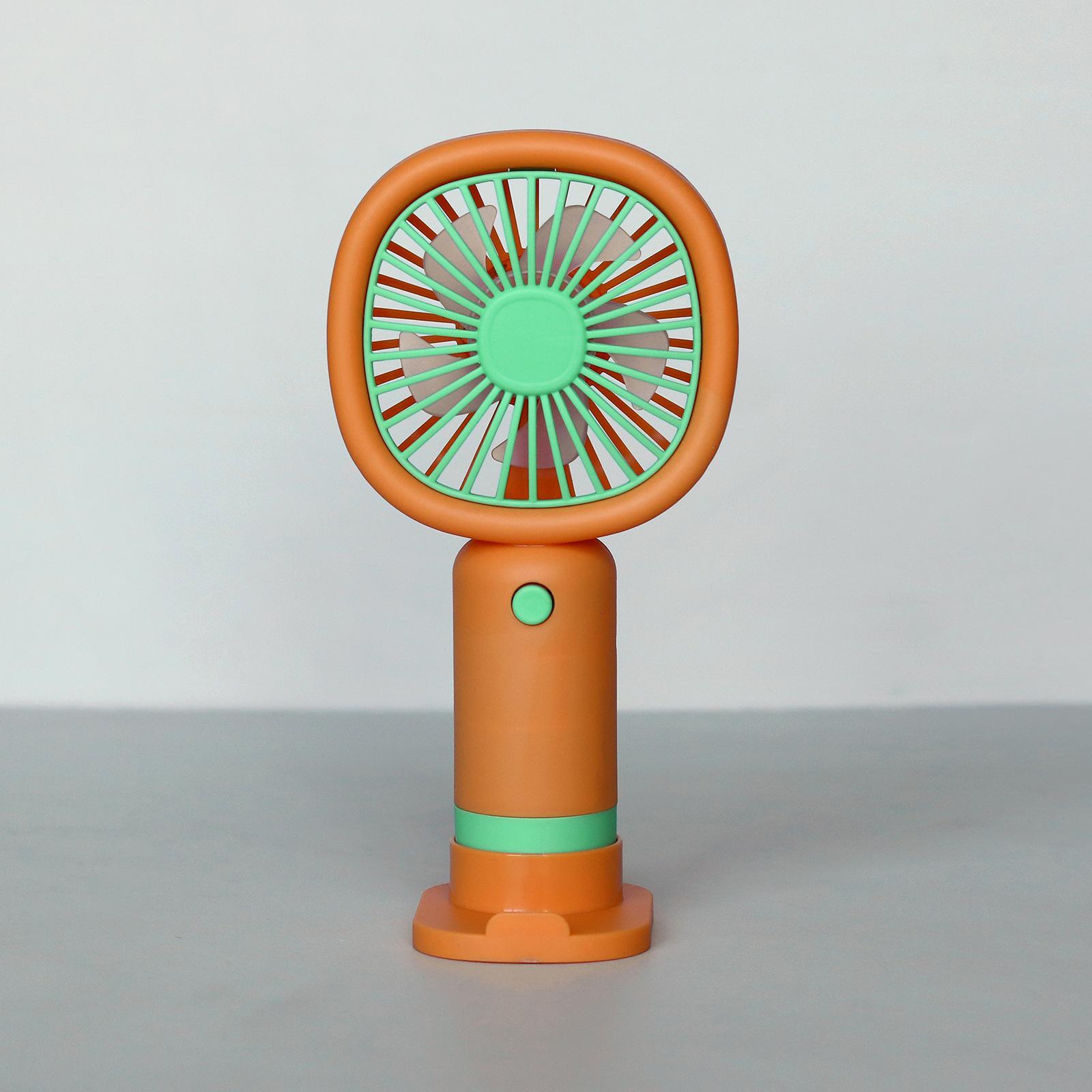 

Portable Handheld Mini Fan with USB Charging and Stand – Ideal for Outdoor and Desktop Use Refer to actual product