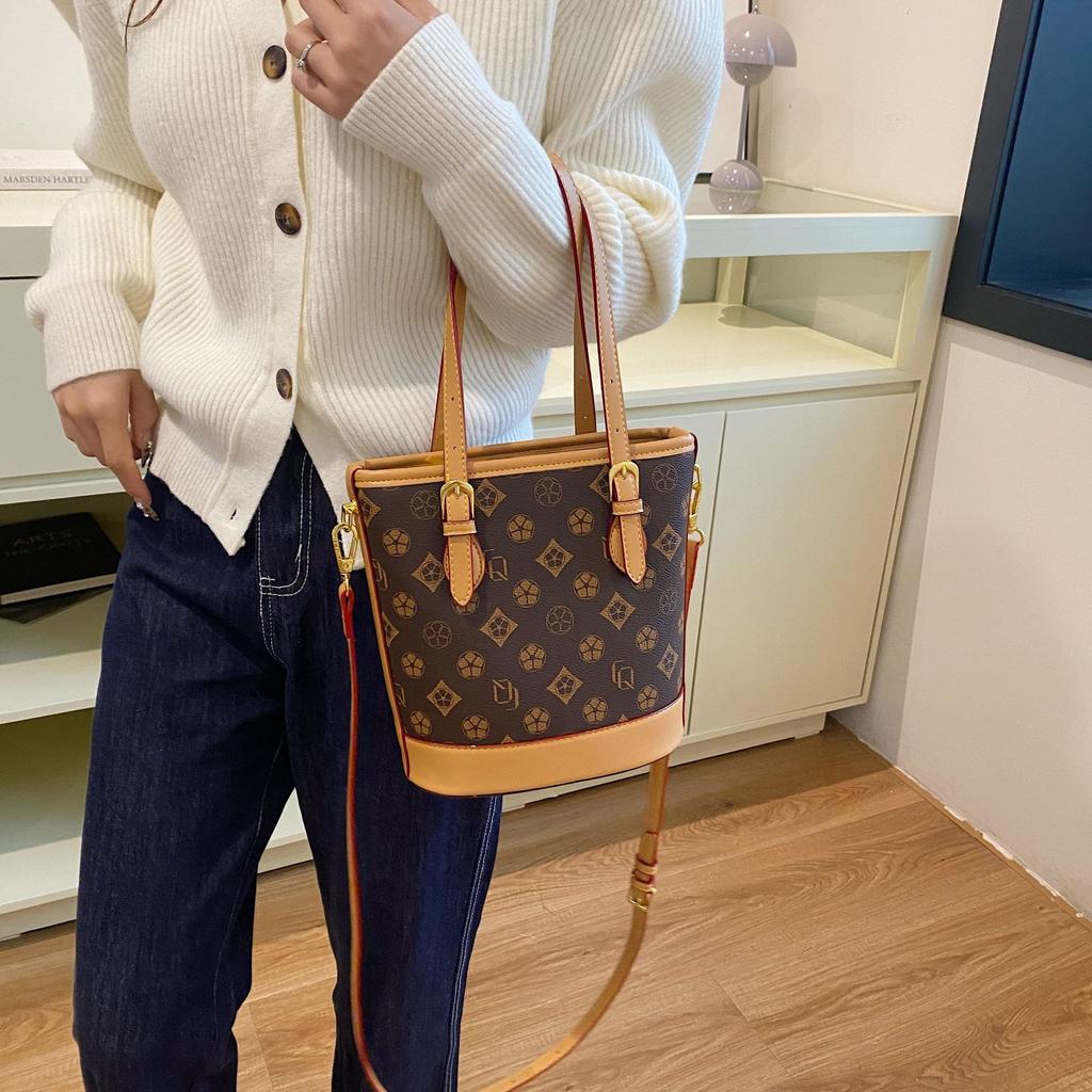 Bucket bag women's new retro simple niche high-end women's handbag diagonal span small women's bag
