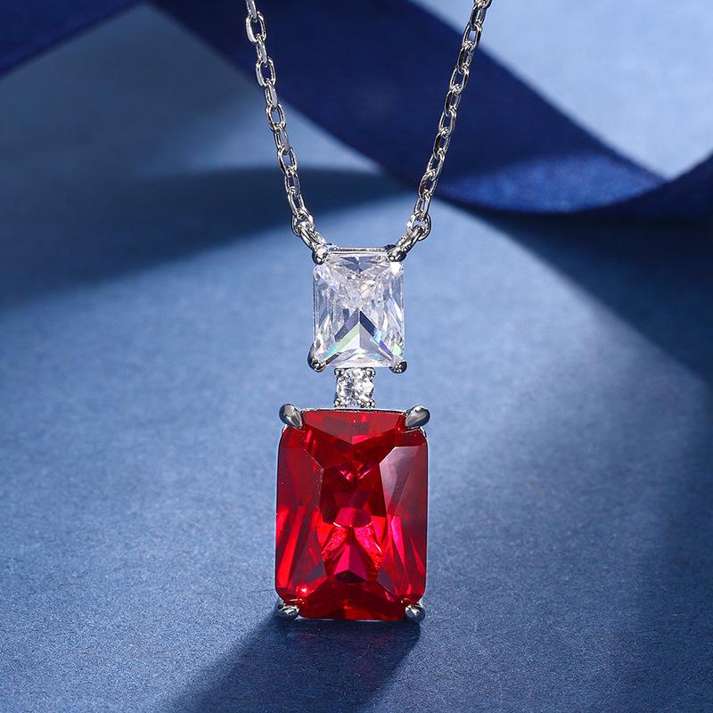 

Ювелирные изделия Медное основание Позолоченная Имитация Корунда Темпераментный Набор Подвеска Серьги 10 * 14