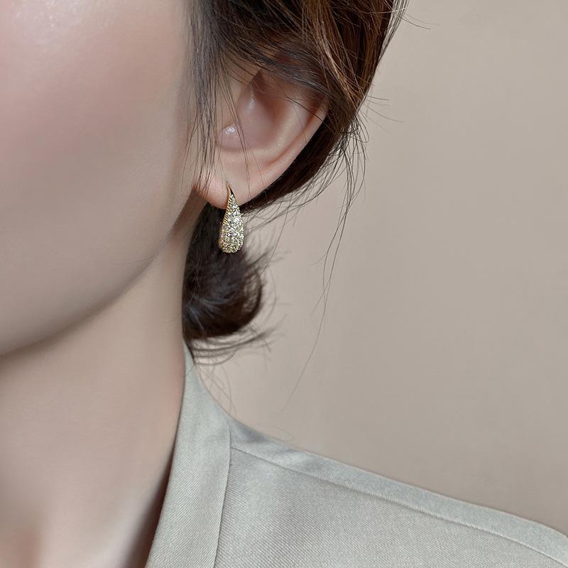 Elegant Zirconia Water Drop Copper Earrings for Women - Versatile, Fashionable, and High-End Feel.