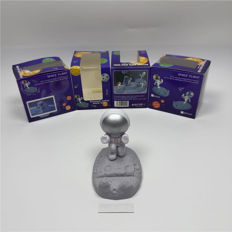 Astronaut Figurine Phone Holder: Creative Plastic Desktop Decor & Gift