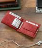 Men's wallet made of natural leather decorated with crosswise stripes