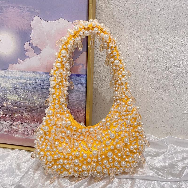 

Шикарная сумка через плечо с жемчужно-кристаллическими бусинами — свежая, универсальная, повседневная, которую можно носить в руке или под мышкой, симпатичный нишевый дизайн. оранжевый