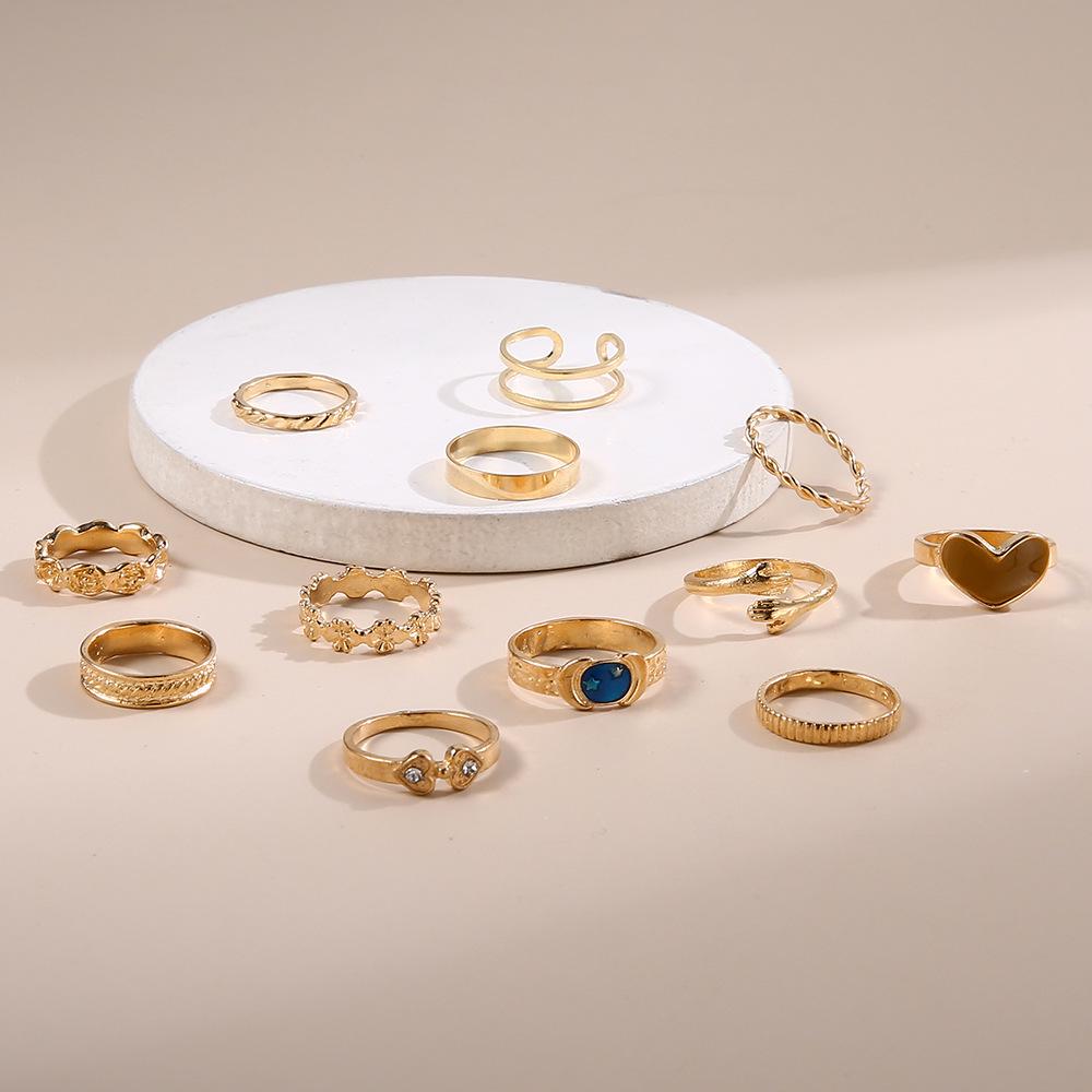 Fashionable Heart-Shaped Rings Set: Twisted Design with Micro-Inlaid Diamonds, 12 Pieces