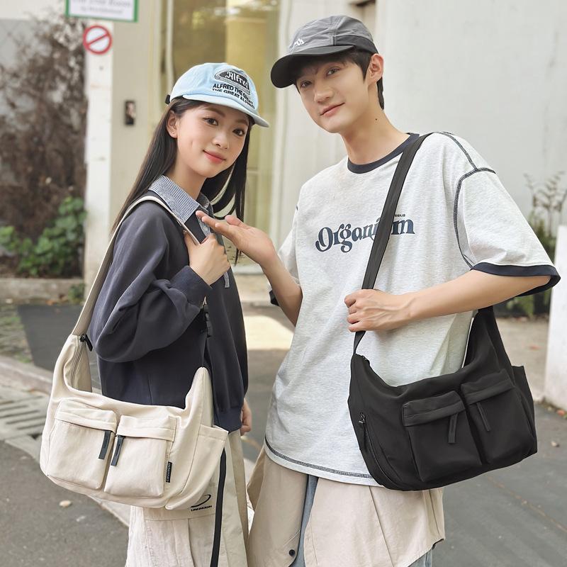 Nylon solid color tooling locomotive men's and women's satchel, new large-capacity double-pocket shoulder messenger bag