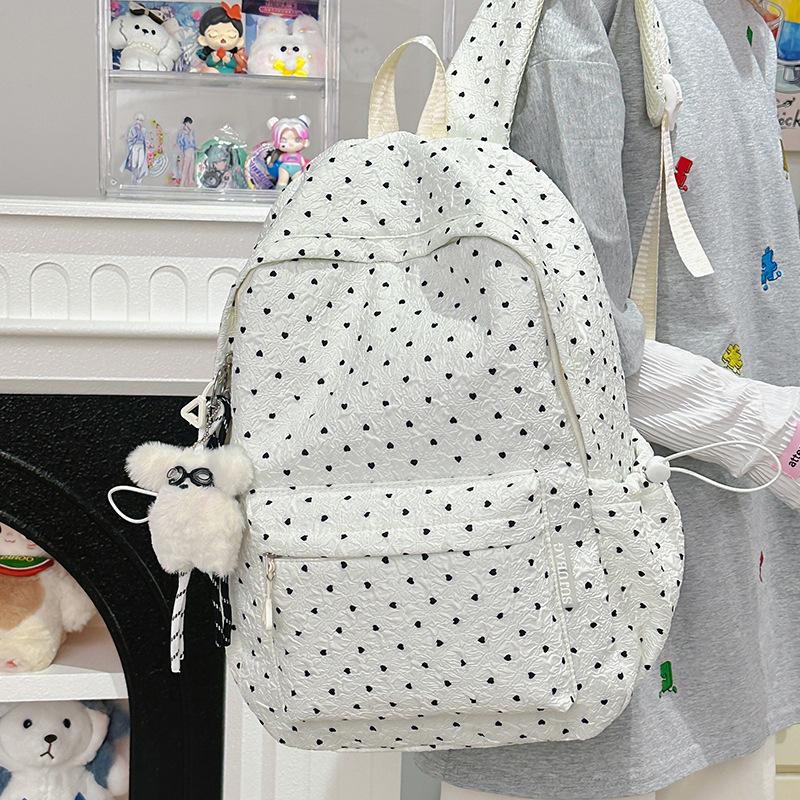 

New Japanese simple polka dot ins schoolbag women s simple large-capacity backpack female primary and secondary school students school bag single bag