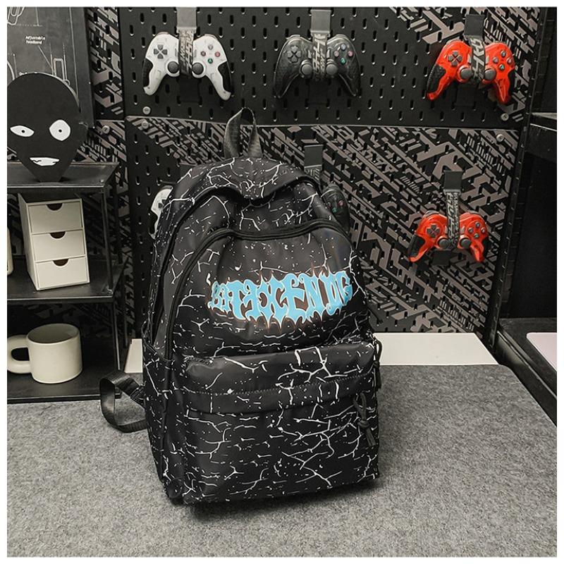 

New high-value Korean version ins trendy and cool graffiti letter backpack couple couple couple lightweight large-capacity backpack