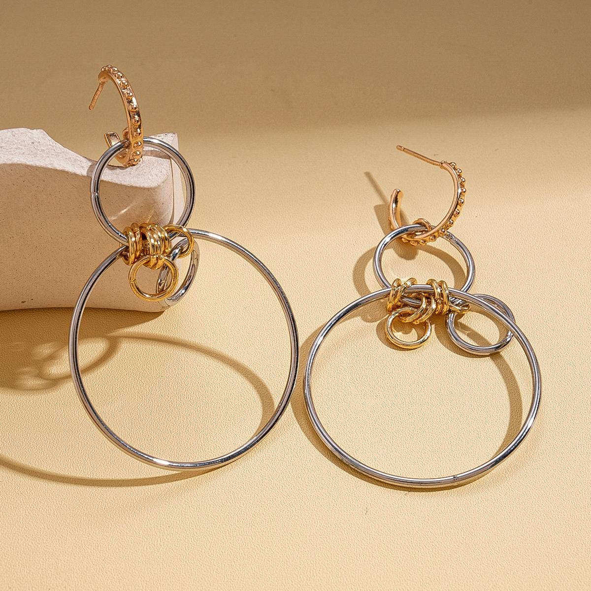 Personalized geometric round cross-hollowed silver needle earrings, unique temperament earrings