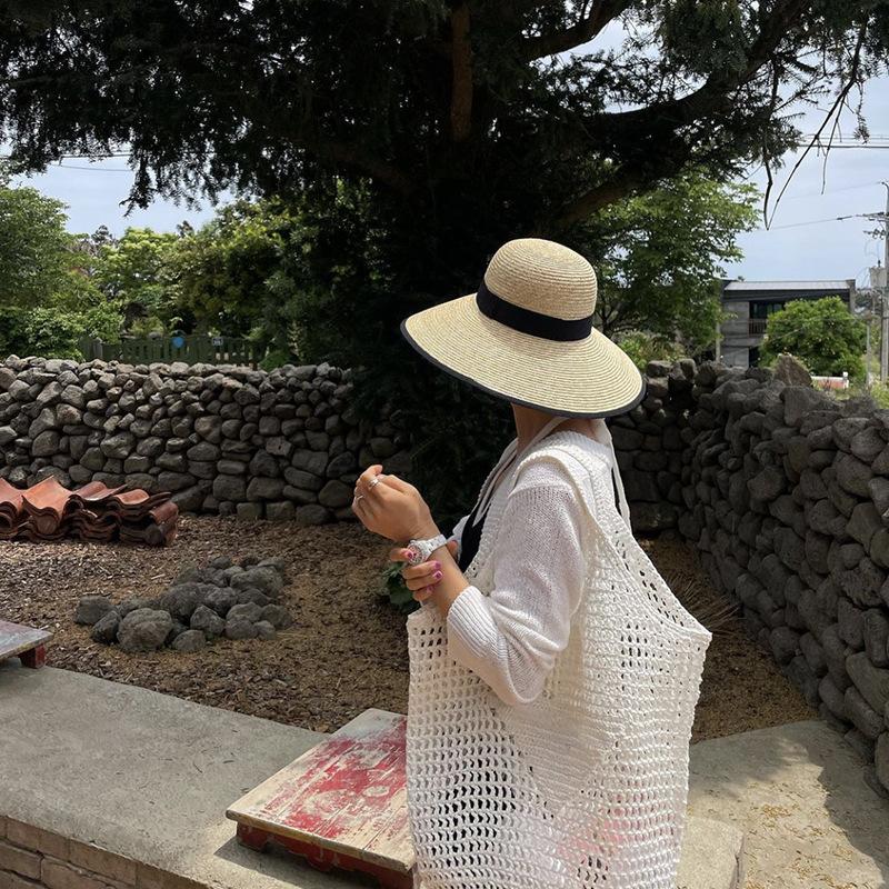 Big brim black hemmed straw straw straw hat women's summer dome retro French elegant Hepburn big edge woven hat