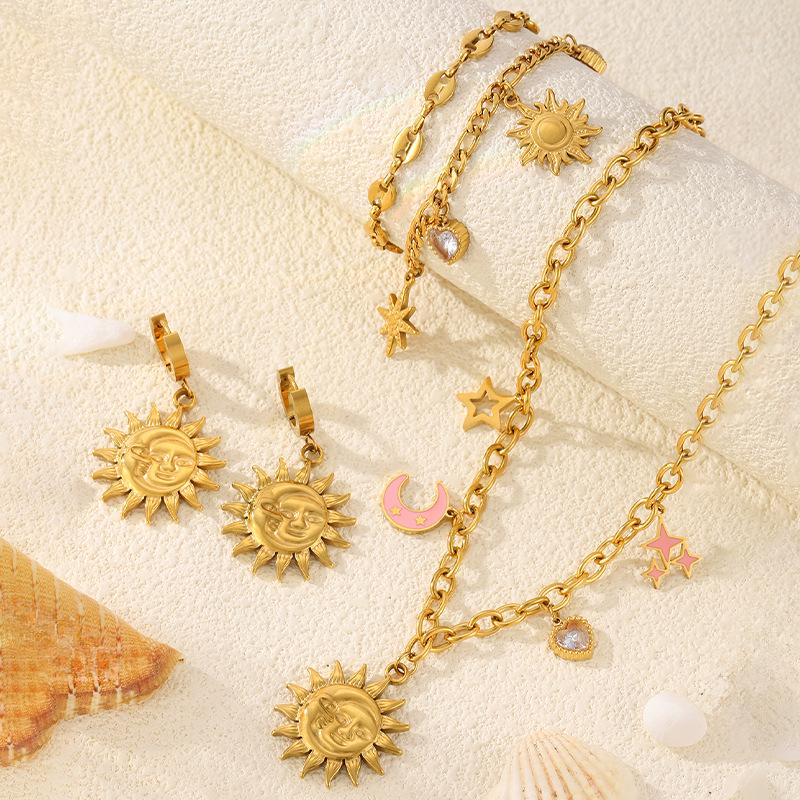 High-End Sun Portrait Titanium Stainless Steel Jewelry Set: Necklace, Bracelet, and Earrings in Light Luxury Design for Women.